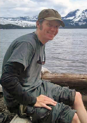 Rob warming his toes at the Paulina Hot Springs